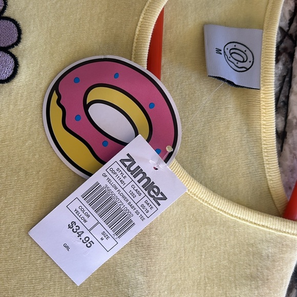 Baby tee/crop top, size M, spring shirt from Zumiez with tags still on the shirt - Picture 2 of 3